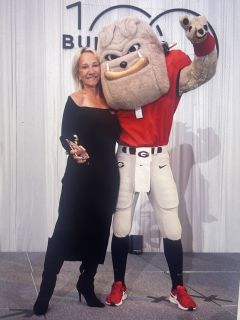 Tammy Wingate, Founder, receives the Bulldog 100 Award.
